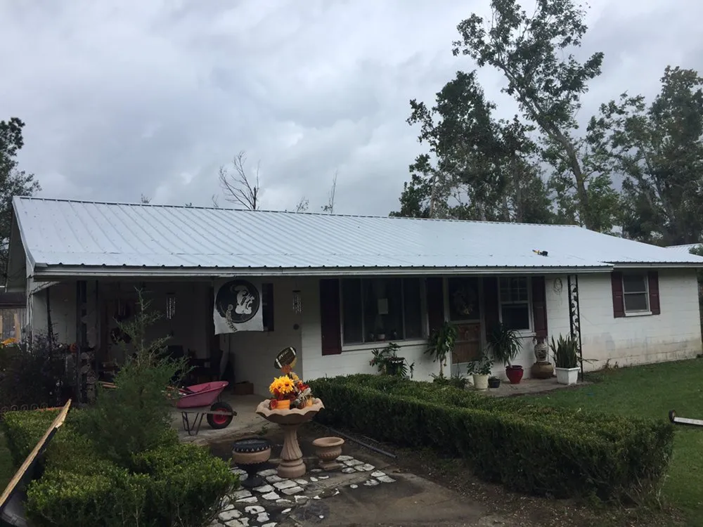 Slide of Carey's Roofing