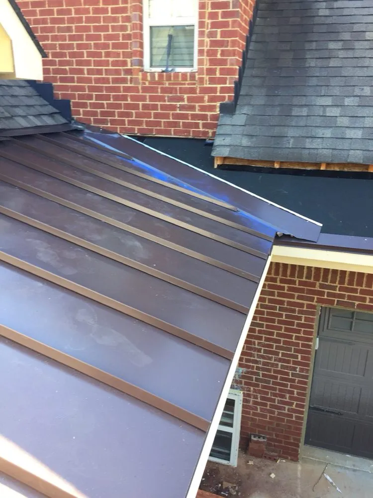 Slide of Carey's Roofing