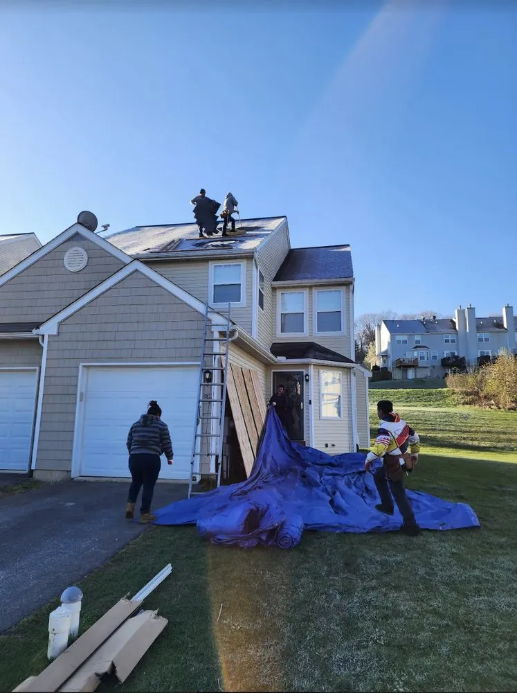 Slide of Caripides Roofing