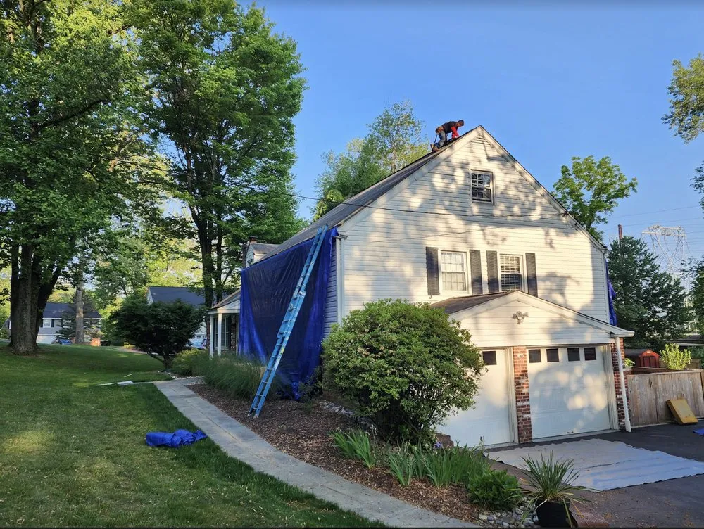 Slide of Caripides Roofing