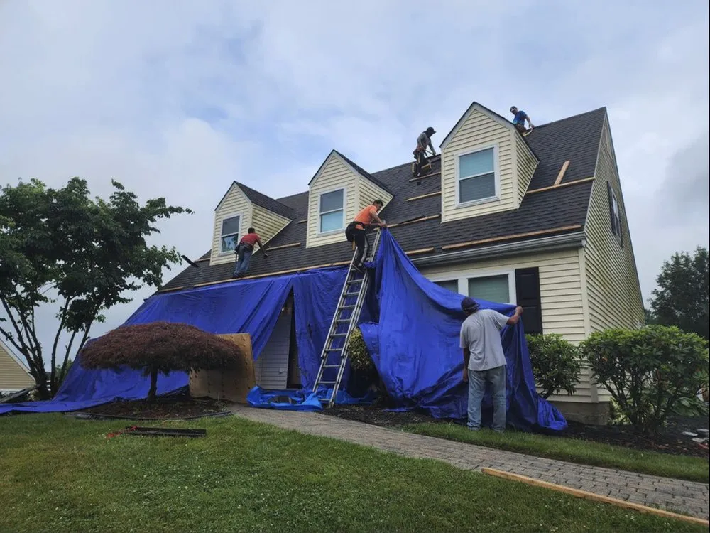 Slide of Caripides Roofing