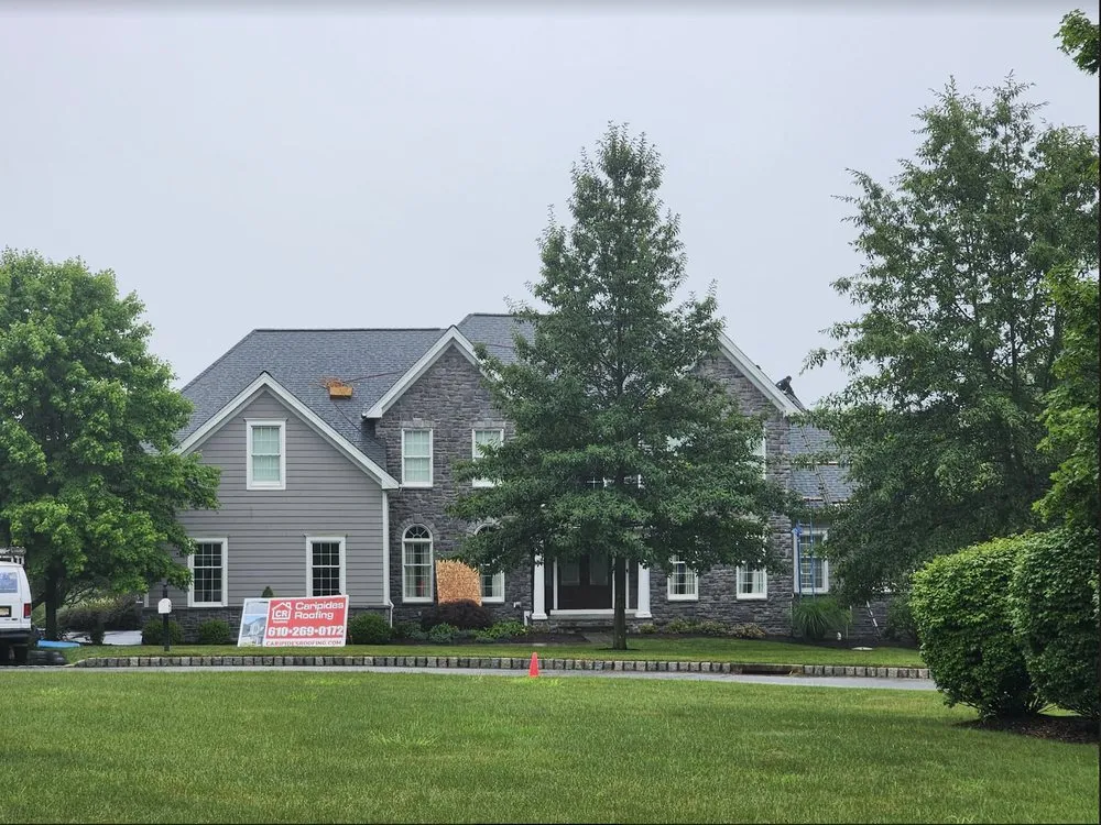 Slide of Caripides Roofing