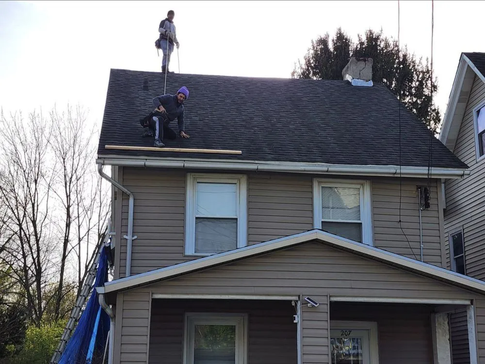 Slide of Caripides Roofing