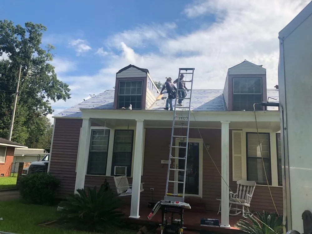 Slide of Carl Fontenot Residential Roofing