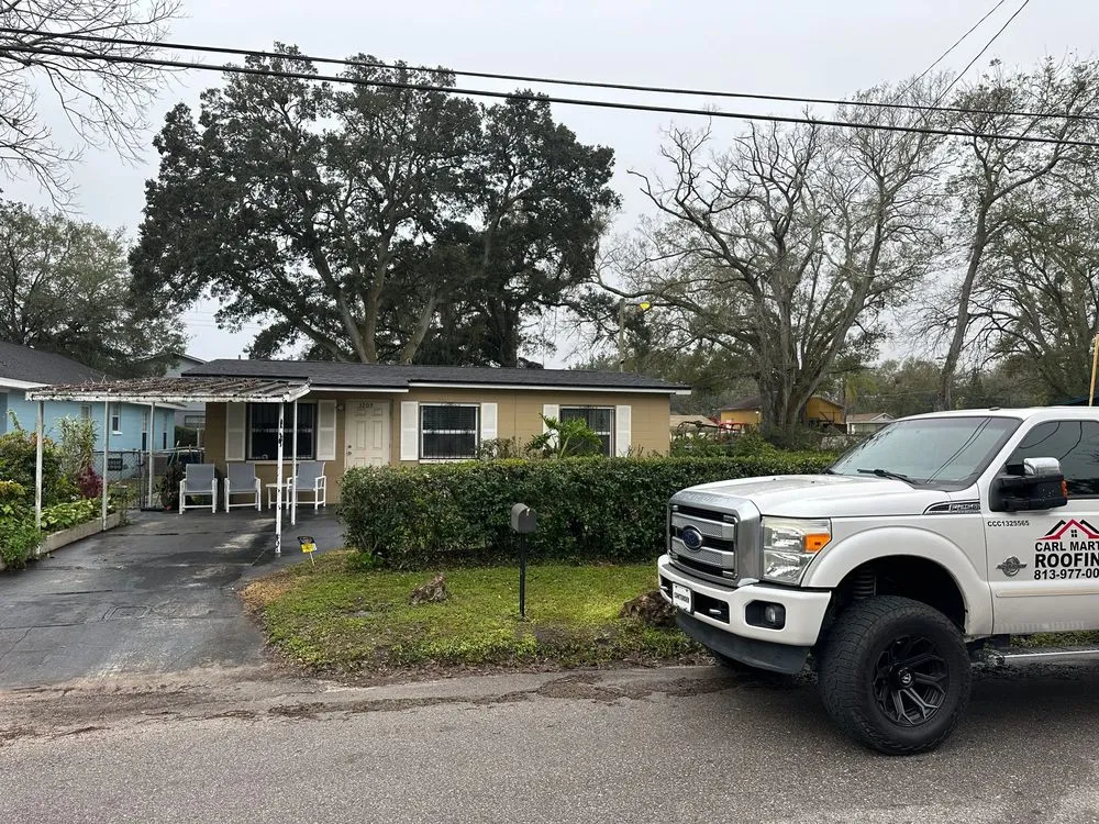 Slide of Carl Martin Roofing