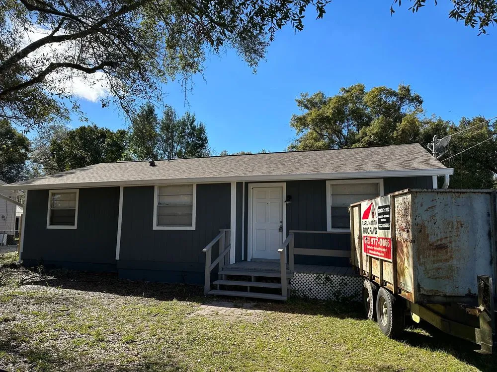 Slide of Carl Martin Roofing