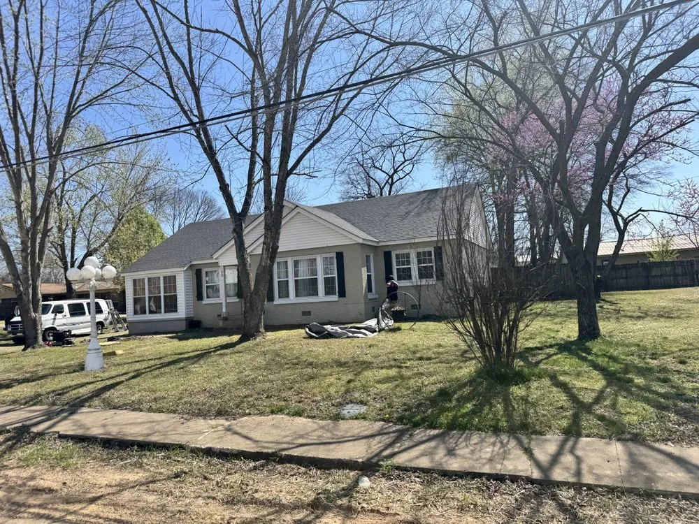 Slide of Carlisle Roofing and Construction