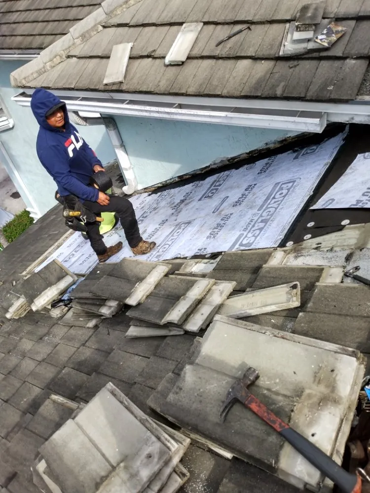 Slide of Carlos Roofing