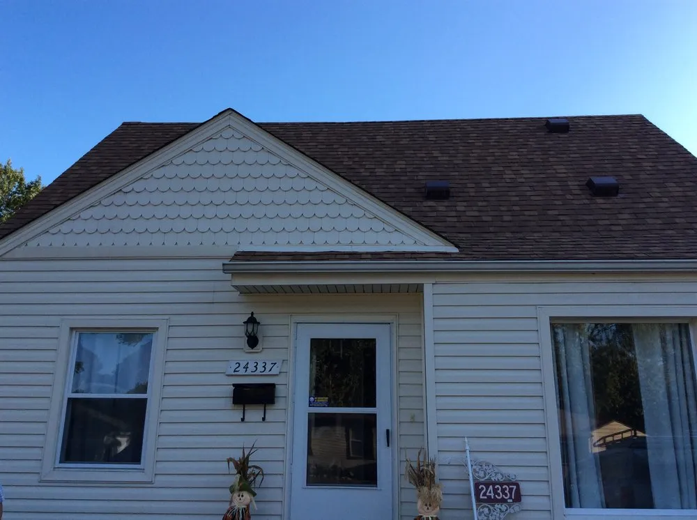 Slide of Carl's Roofing