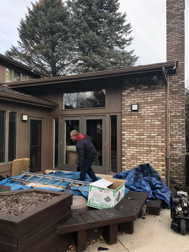 Slide of Carl's Roofing