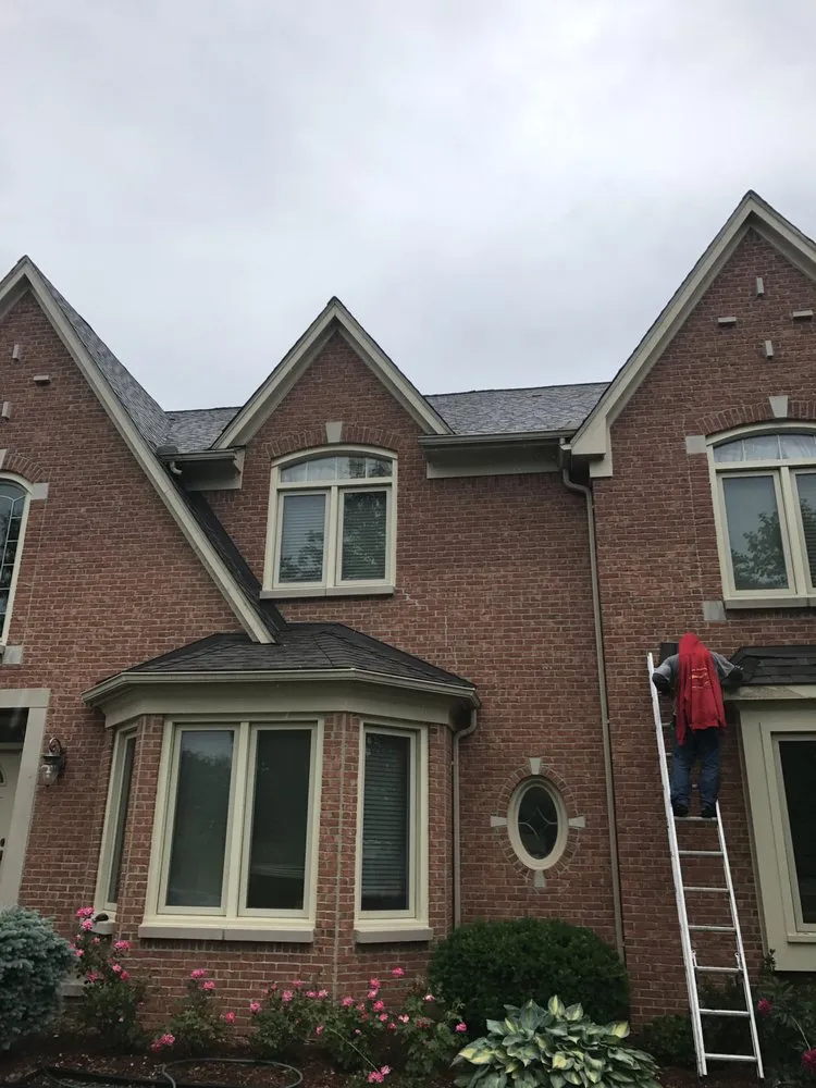 Slide of Carl's Roofing