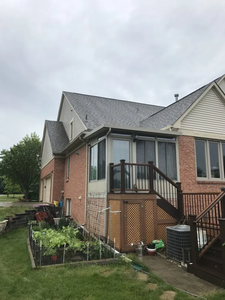 Slide of Carl's Roofing