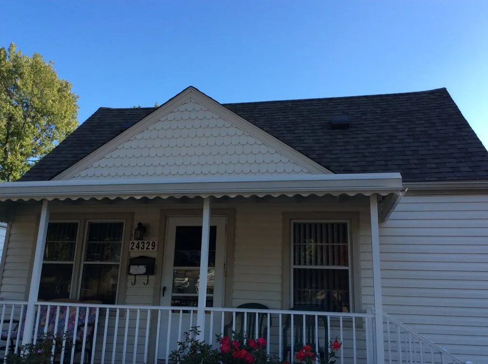 Slide of Carl's Roofing