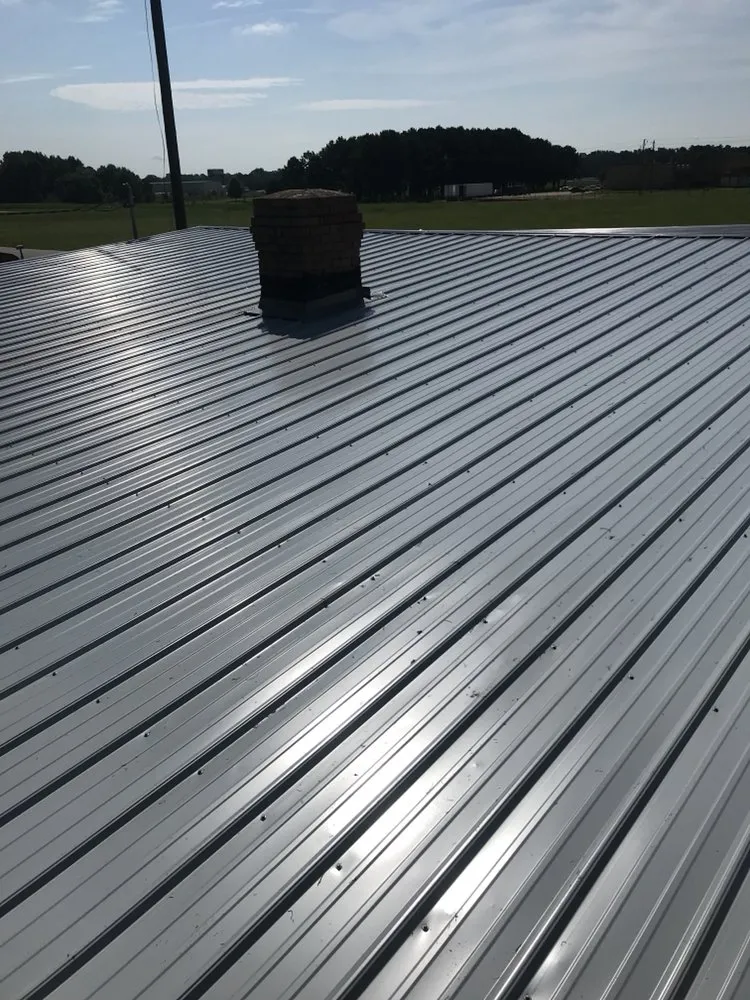 Slide of Carolina Quality Roofing