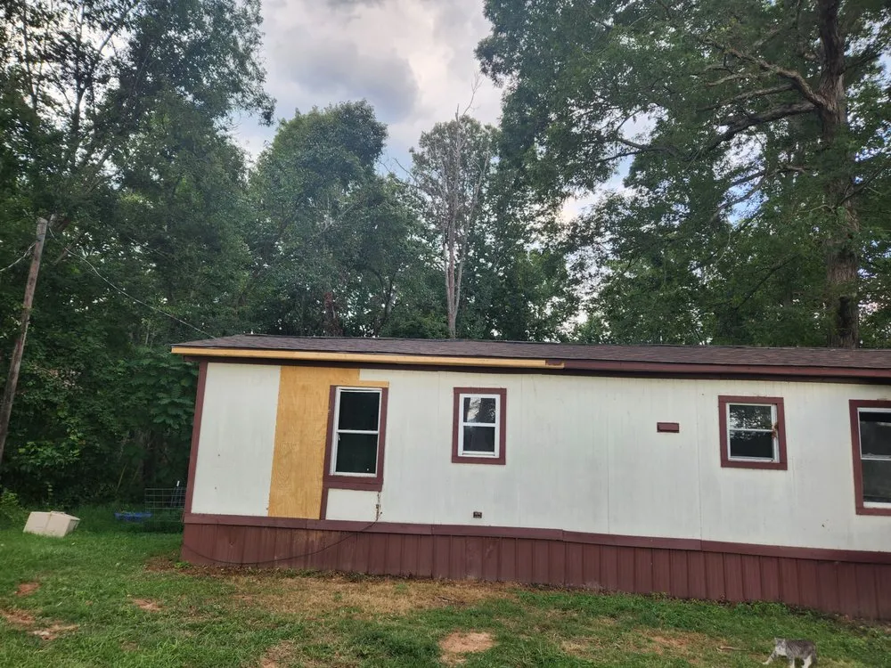 Slide of Carolina Roofing