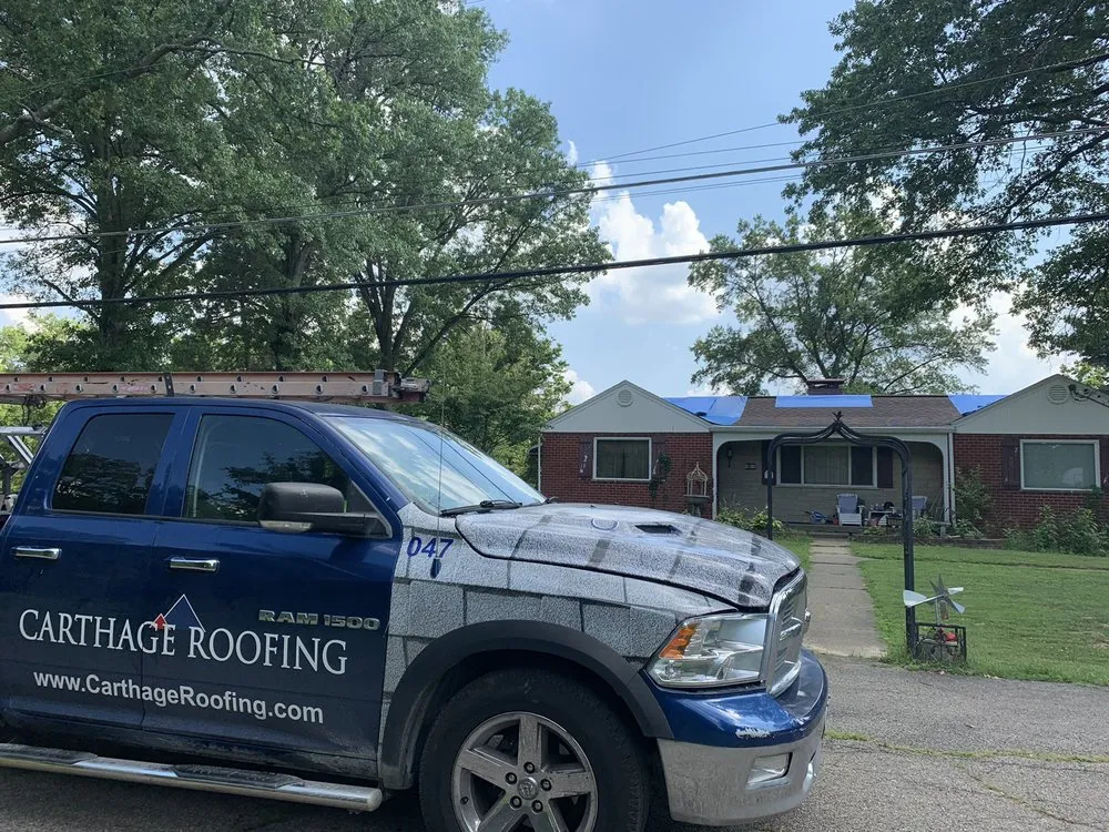 Slide of Carthage Roofing