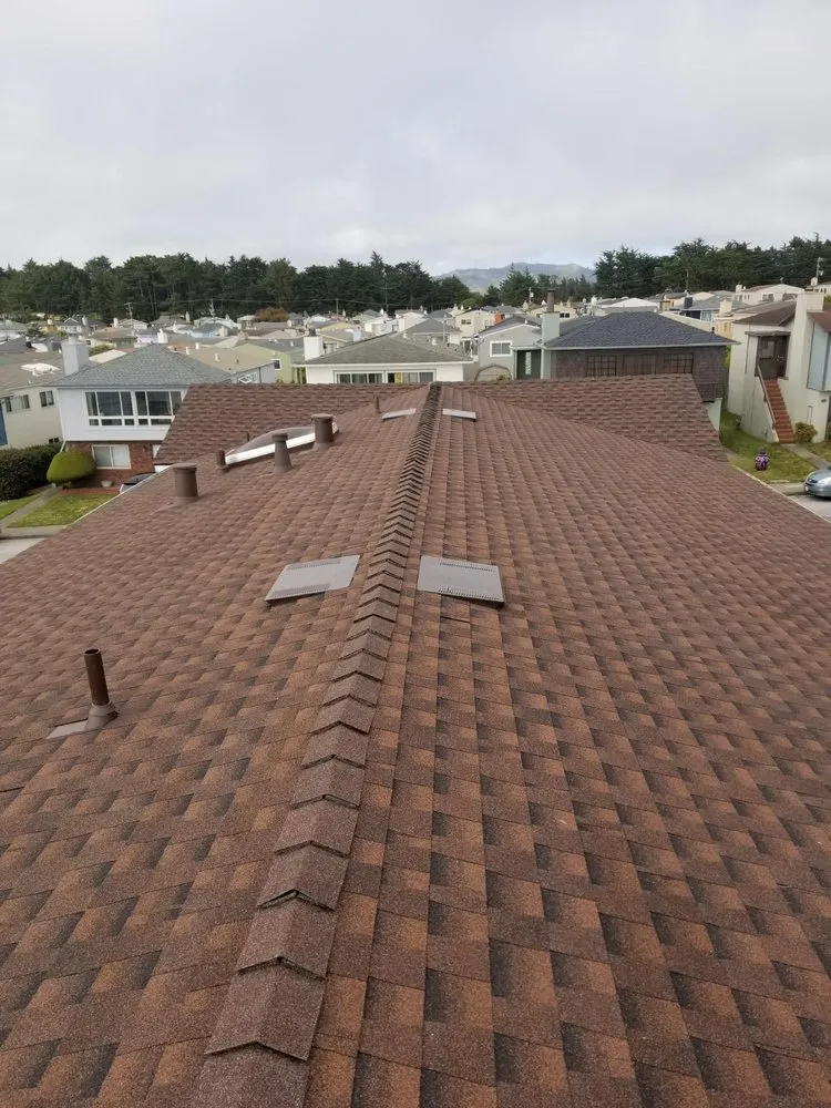 Slide of Caruzo's Roofing Contractors