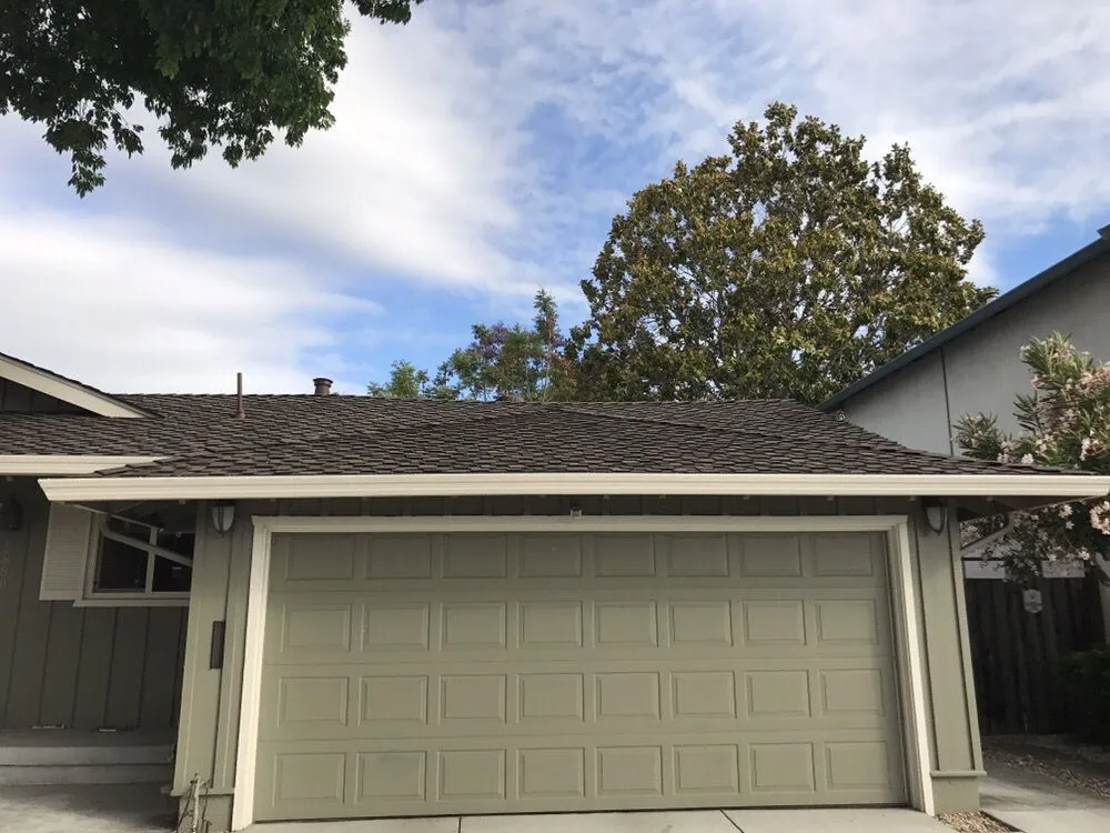 Slide of Caruzo's Roofing Contractors