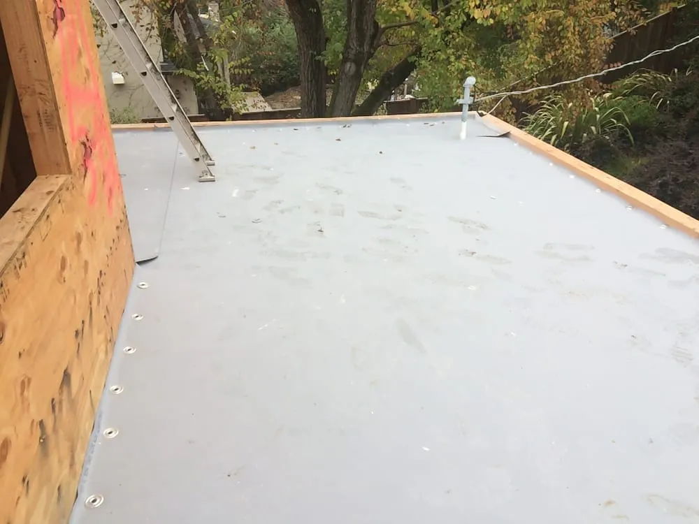 Slide of Caruzo's Roofing Contractors