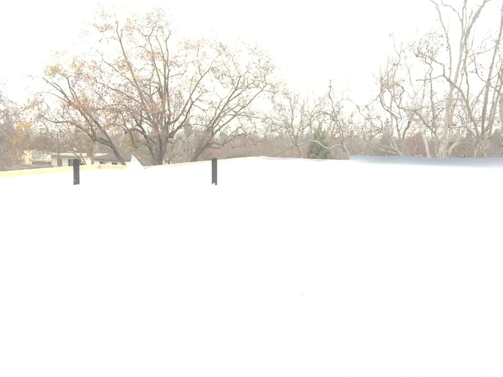 Slide of Caruzo's Roofing Contractors