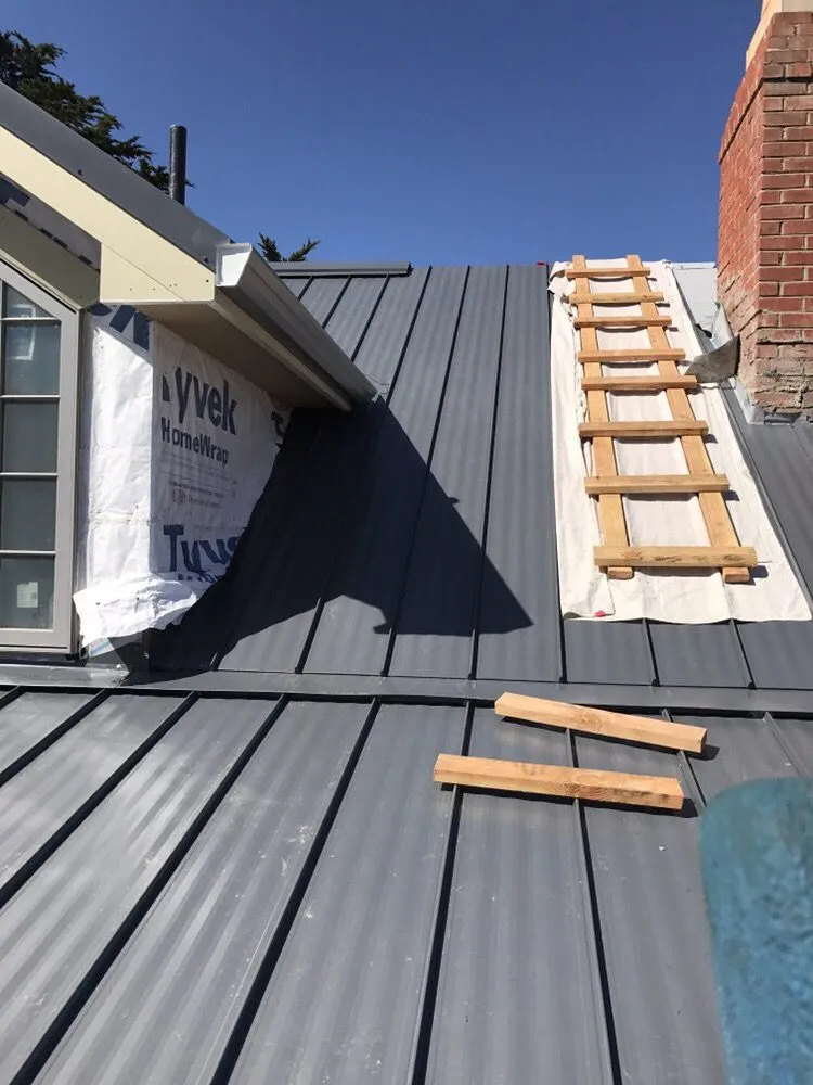 Slide of Caruzo's Roofing Contractors