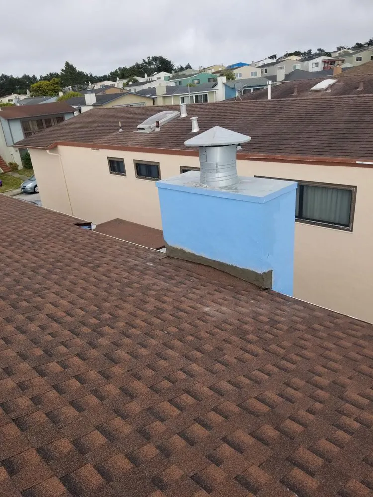 Slide of Caruzo's Roofing Contractors