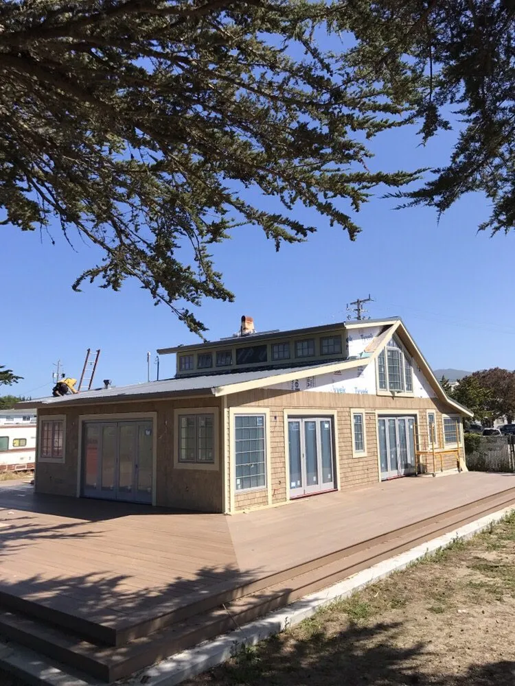 Slide of Caruzo's Roofing Contractors