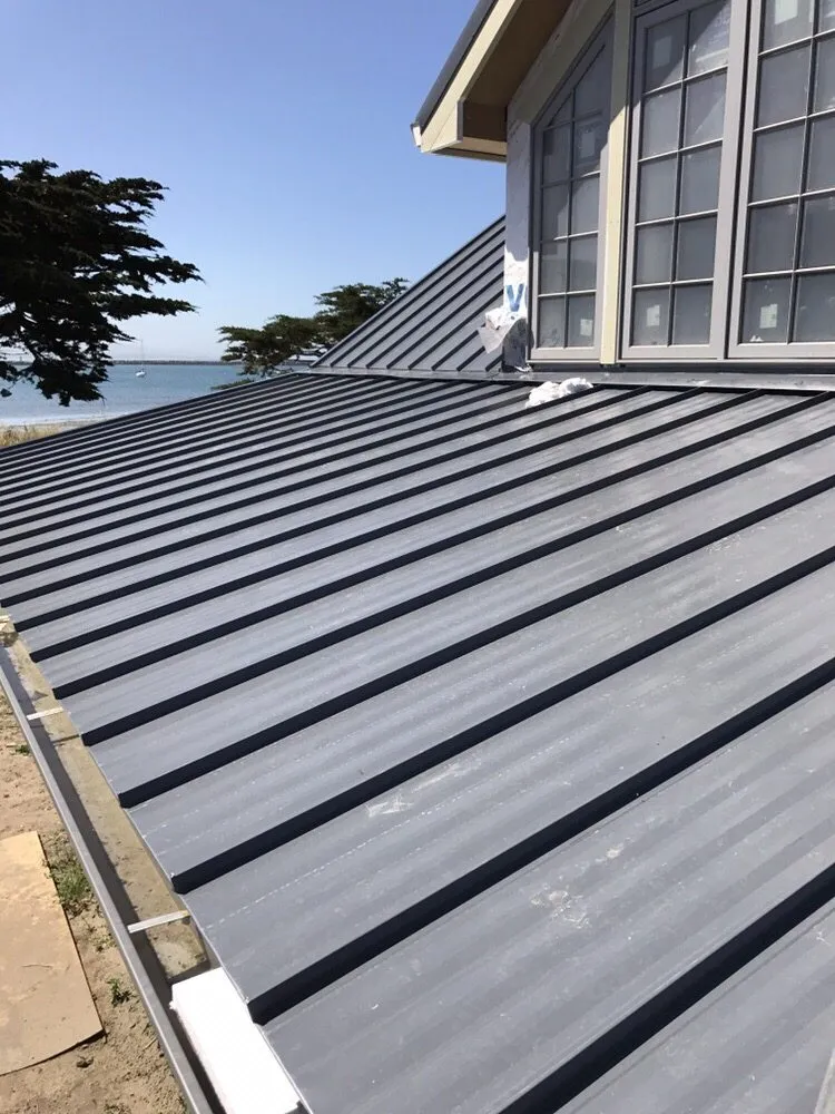 Slide of Caruzo's Roofing Contractors