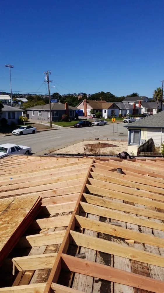 Slide of Caruzo's Roofing Contractors