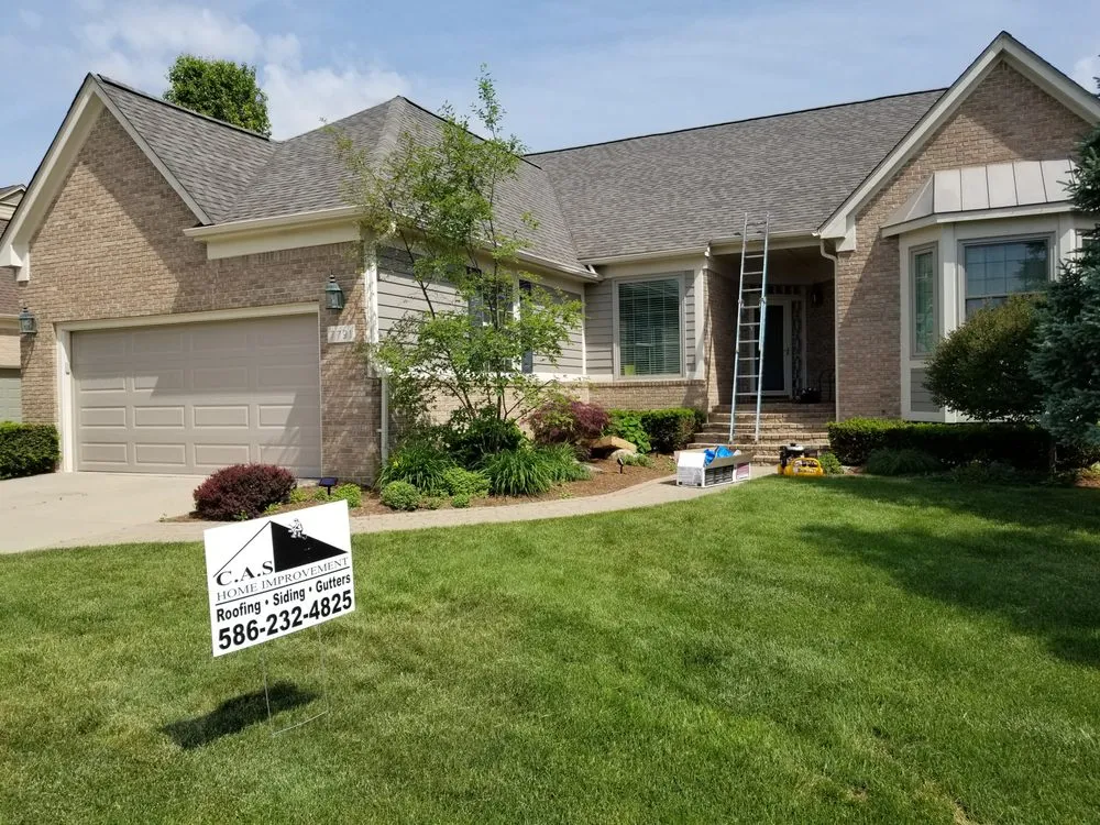 Slide of C.A.S. Roofing and Siding
