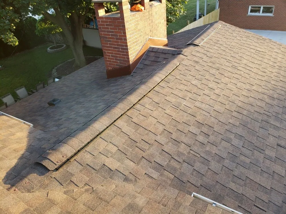 Slide of C.A.S. Roofing and Siding