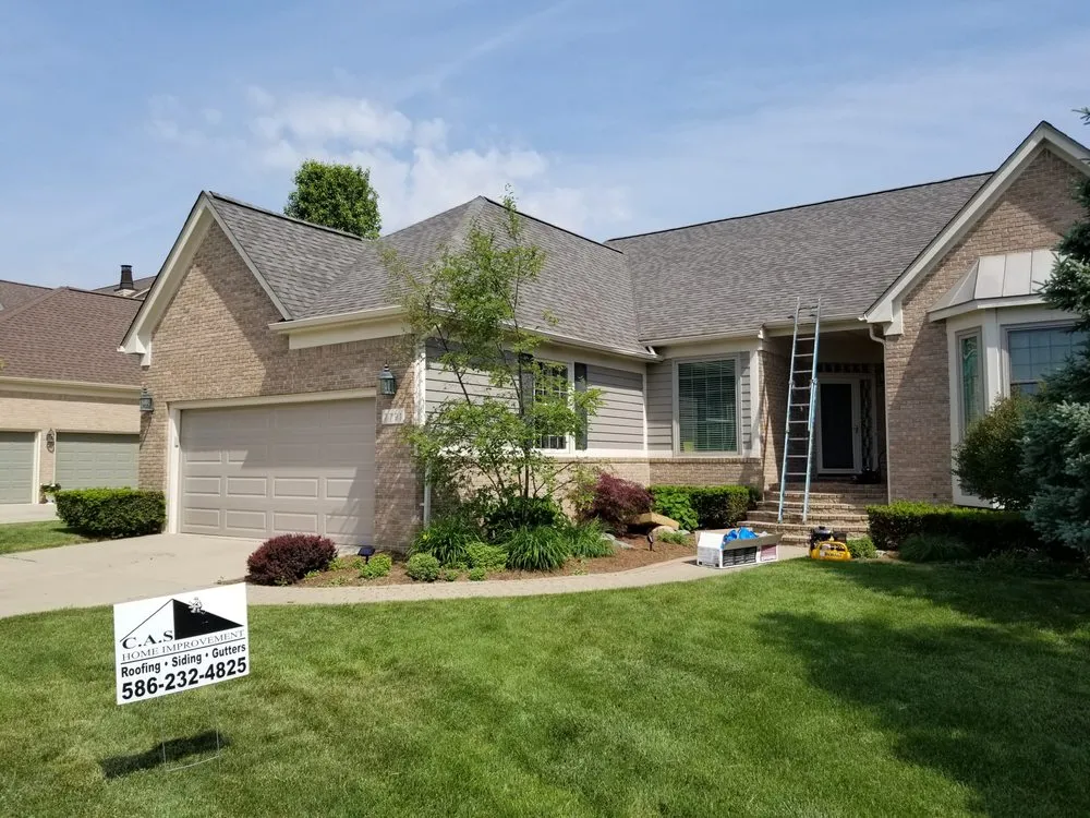 Slide of C.A.S. Roofing and Siding