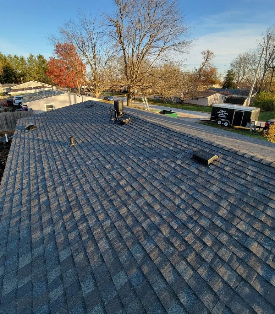 Slide of Casey & Son's Roofing