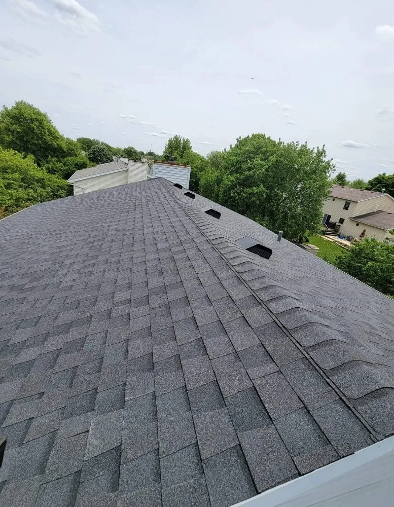 Slide of Casey & Son's Roofing