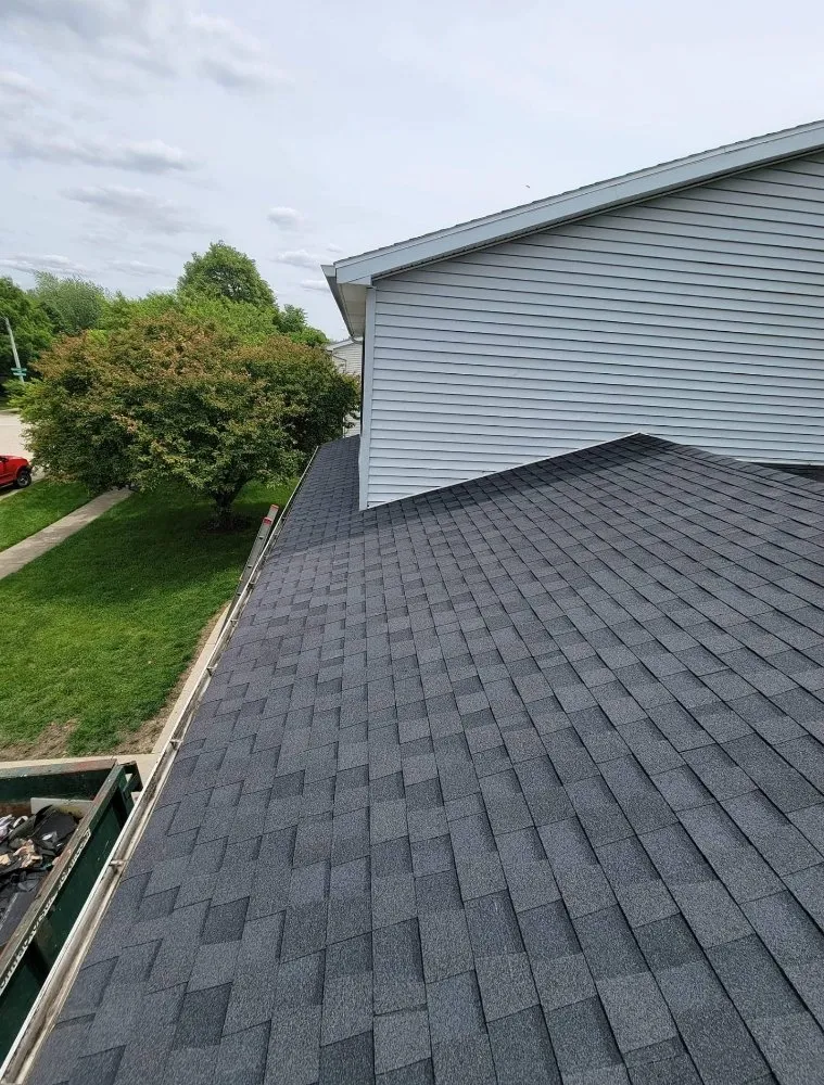 Slide of Casey & Son's Roofing