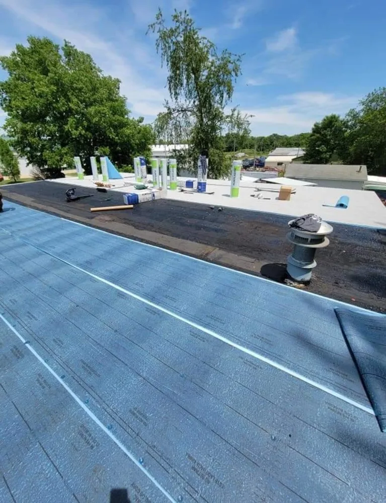 Slide of Casey & Son's Roofing