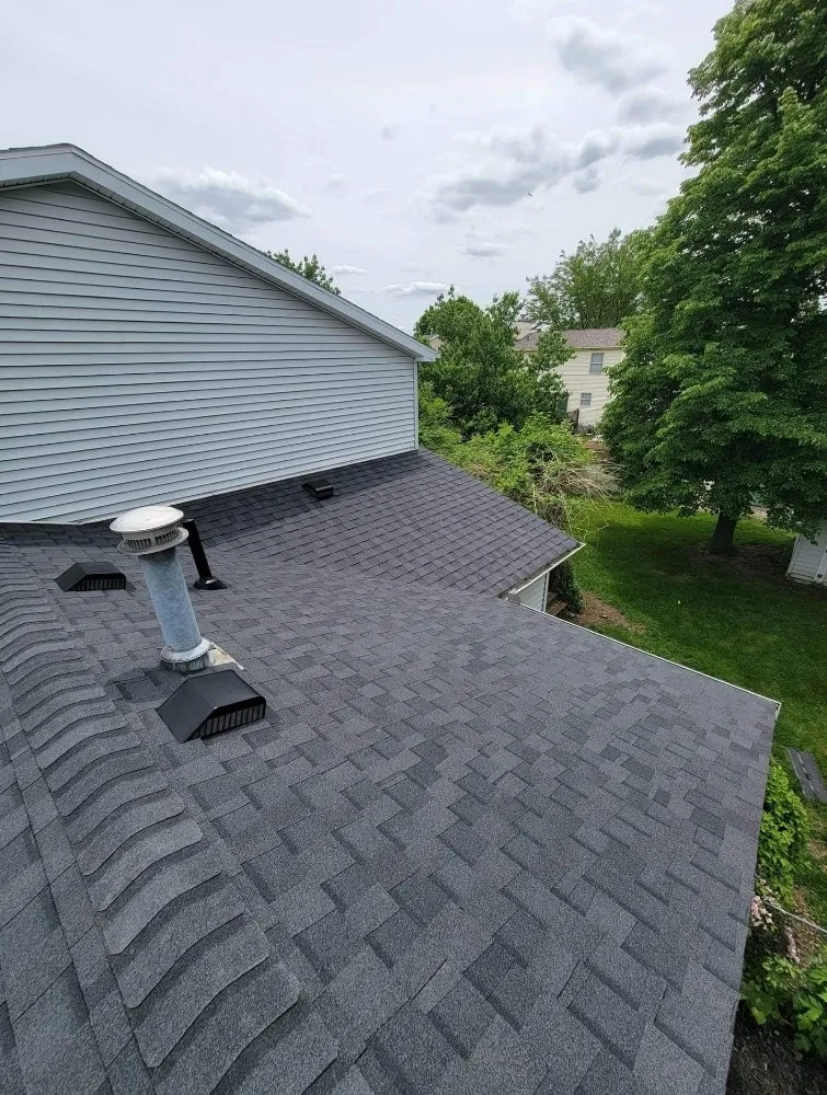 Slide of Casey & Son's Roofing