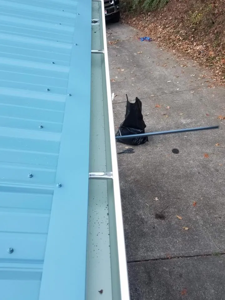 Slide of Casey’s Continuous Gutters and Metal Roofs