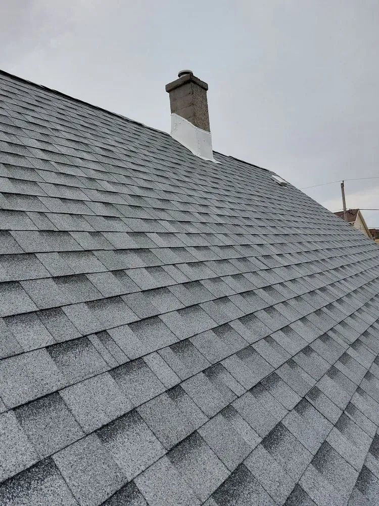 Slide of Castillo Roofing