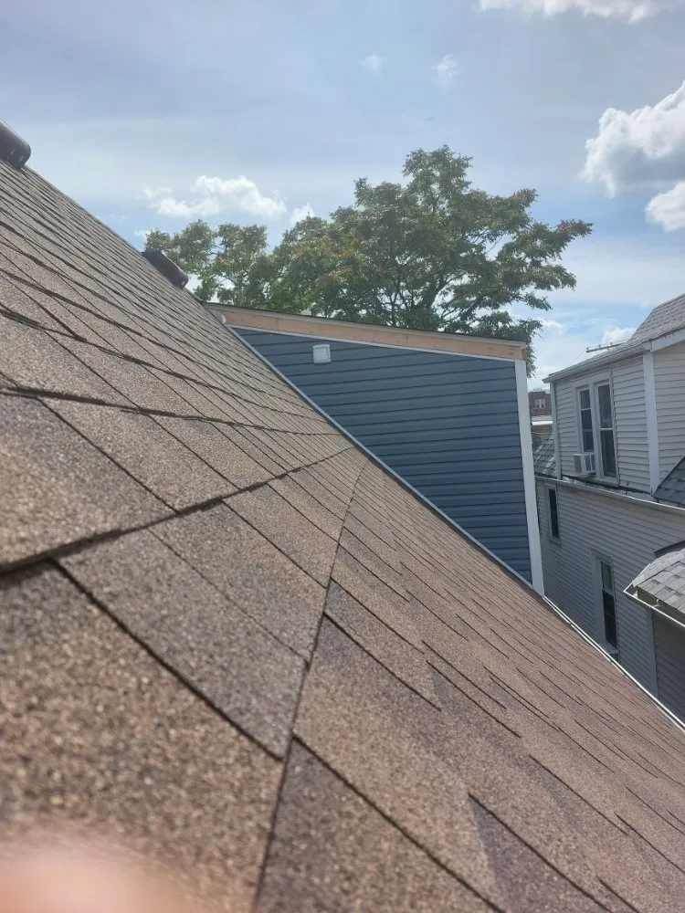 Slide of Castillo Roofing