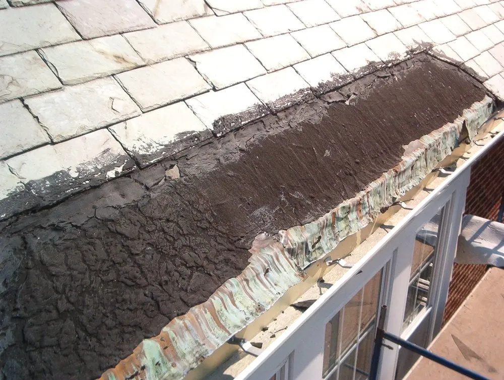 Slide of Castle Slate Roofing Company