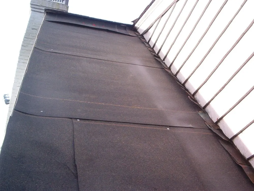 Slide of Castle Slate Roofing Company