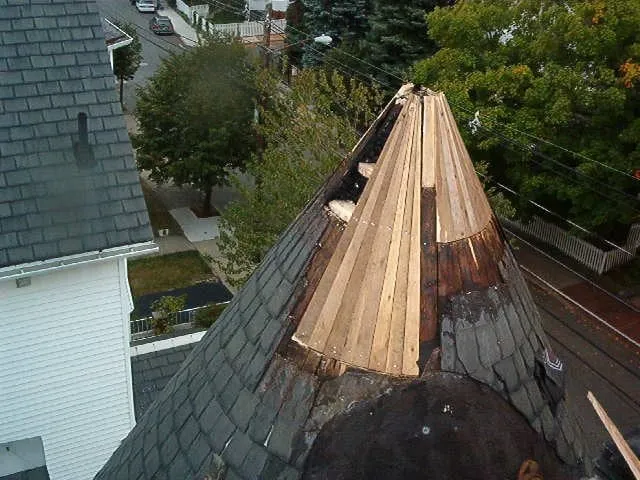 Slide of Castle Slate Roofing Company