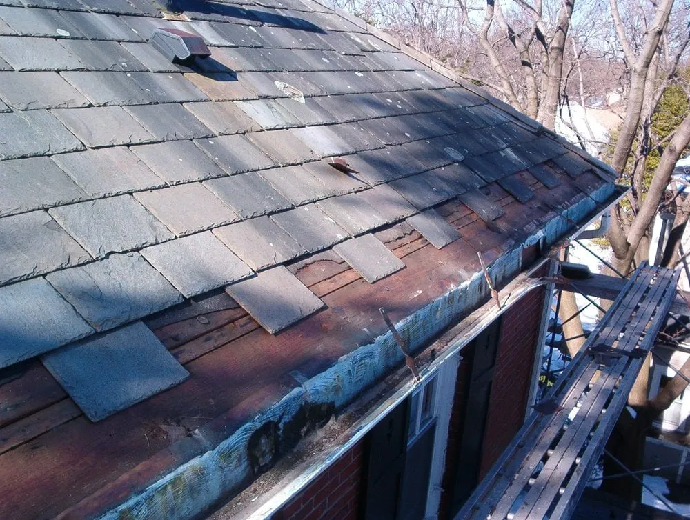 Slide of Castle Slate Roofing Company