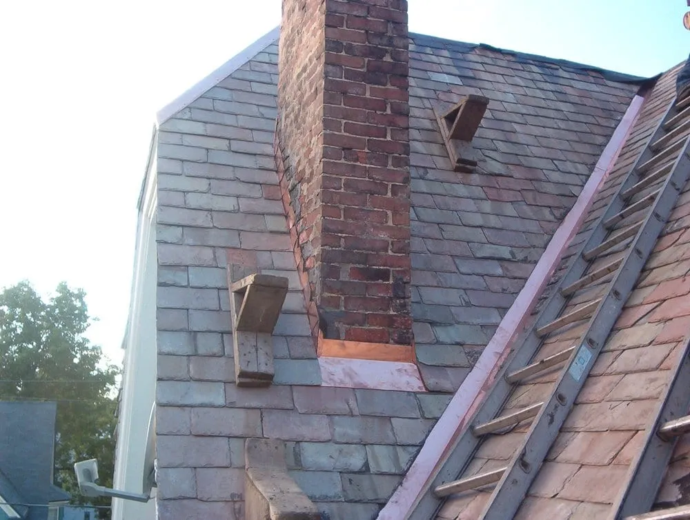 Slide of Castle Slate Roofing Company