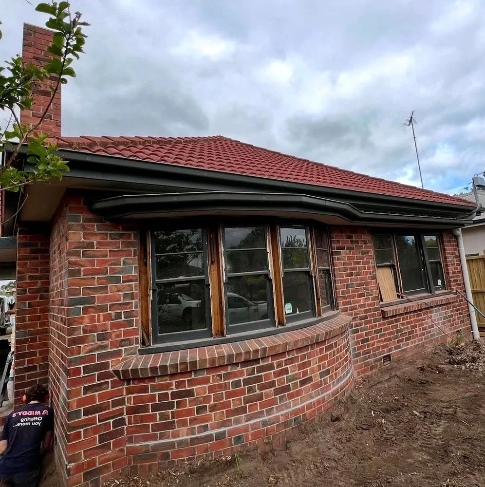 Slide of Castlemont Roofing