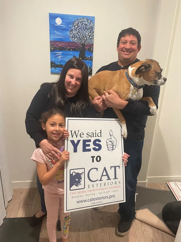 Slide of CAT Exteriors