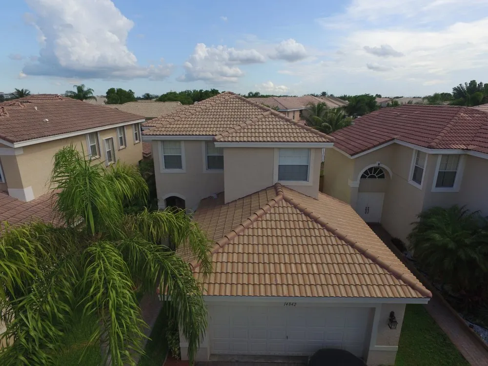 Slide of Caye Works Roofing