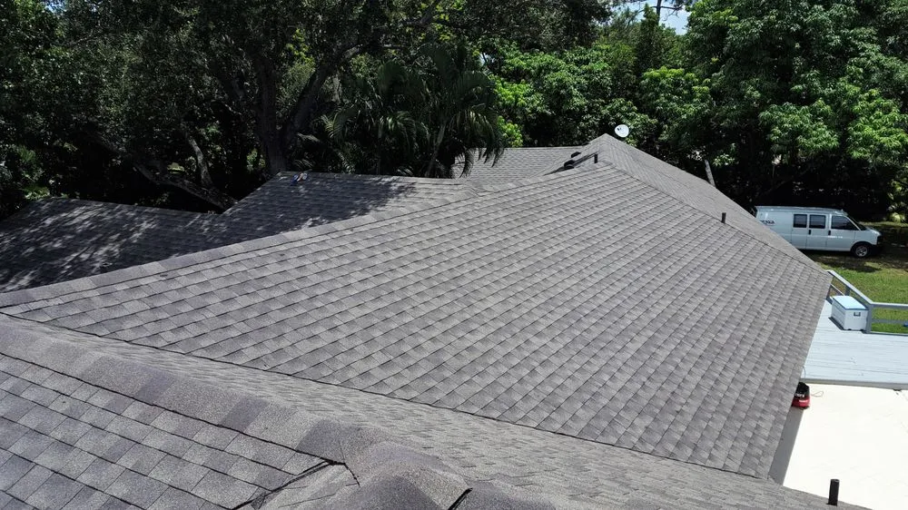 Slide of Caye Works Roofing