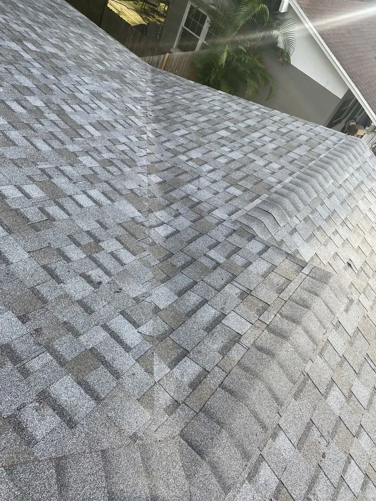 Slide of CB Roofing Construction